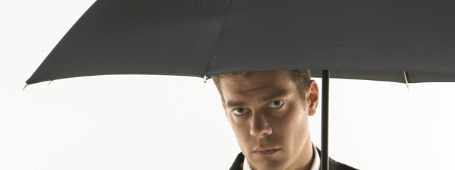 man under umbrella